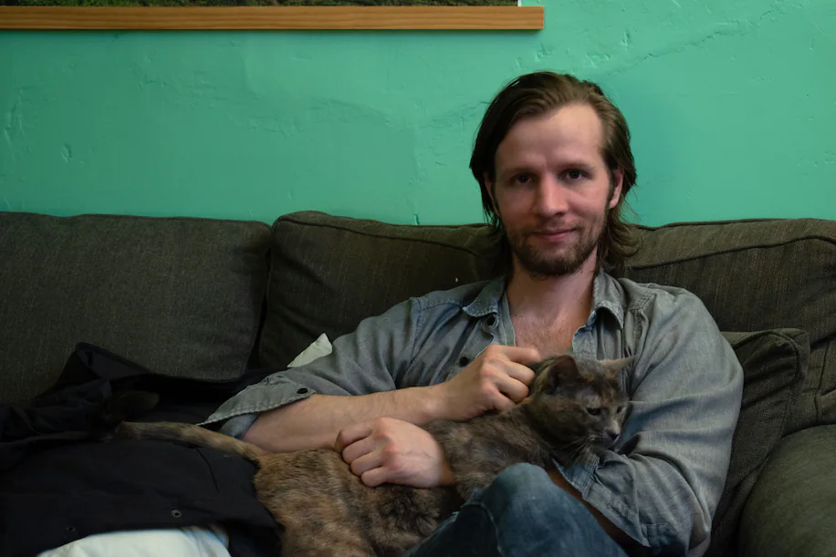 Daniel Hale, with Leila the cat
